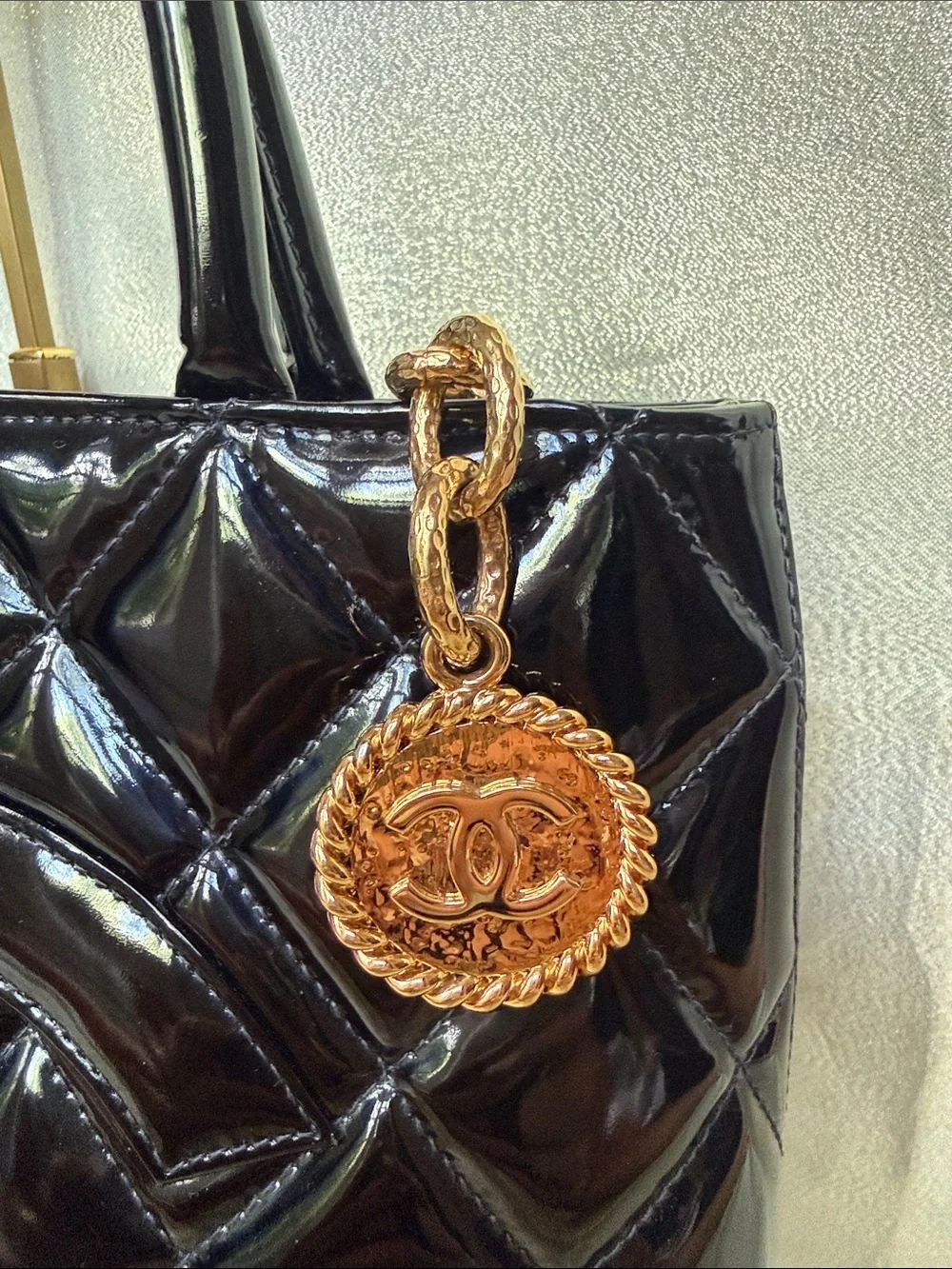 CHANEL glossy black